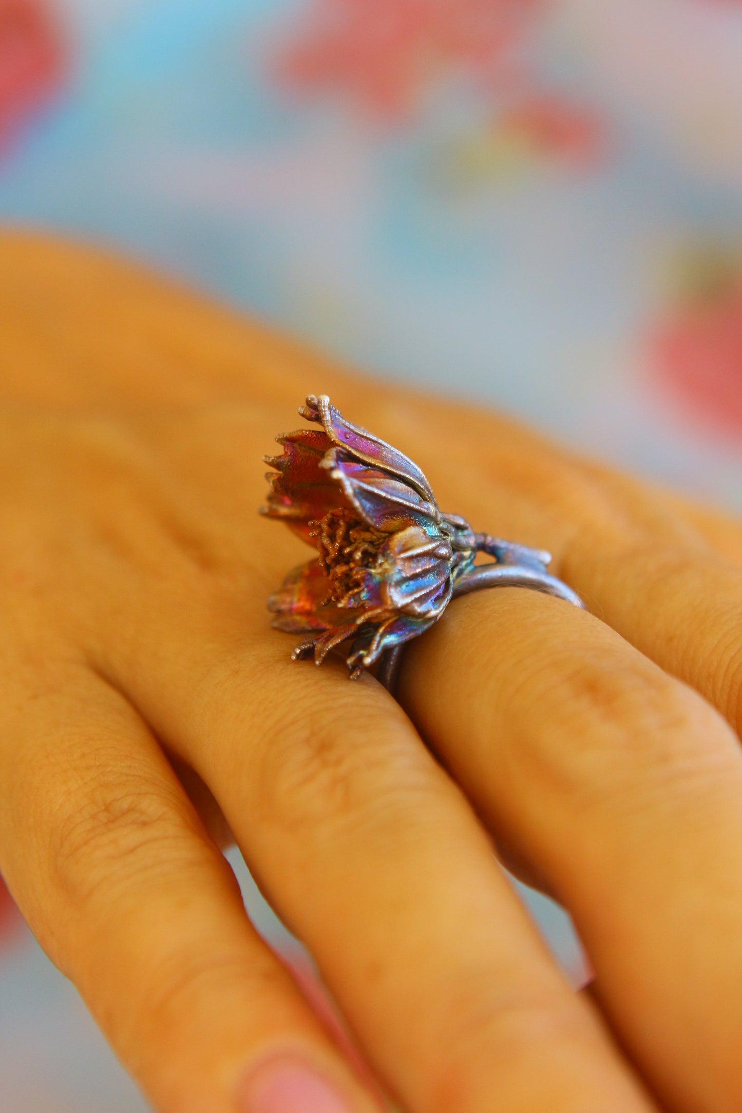 Anel com flor de cosmos