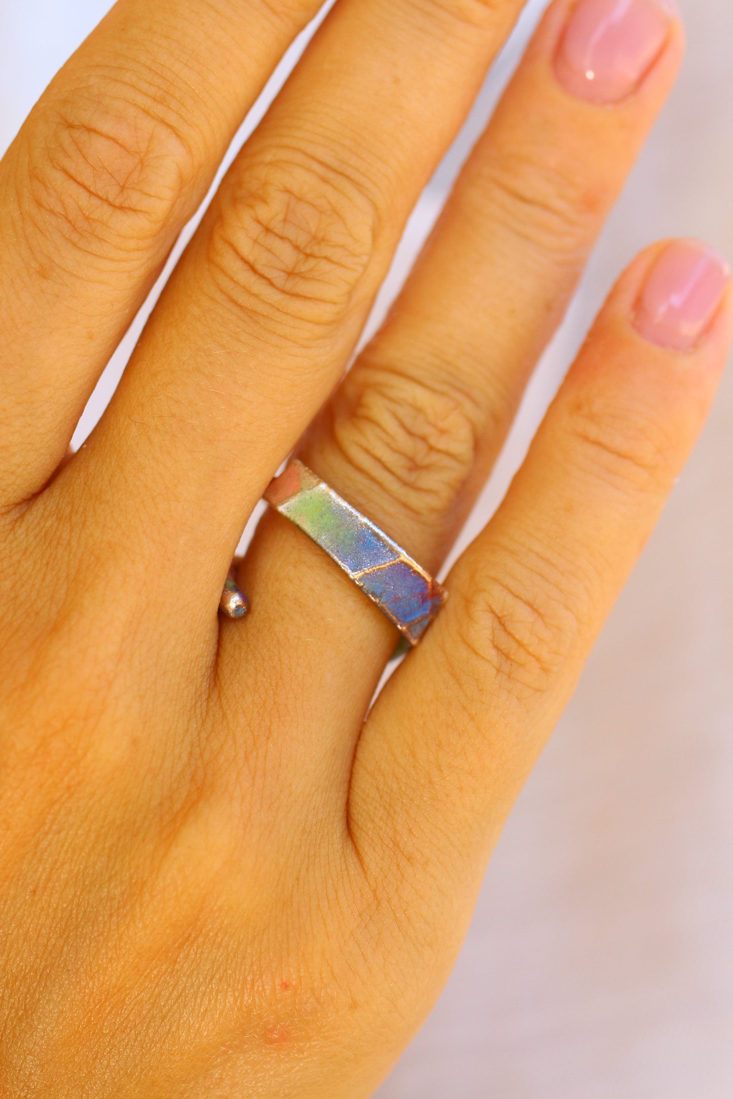 Anel com fragmento de folha