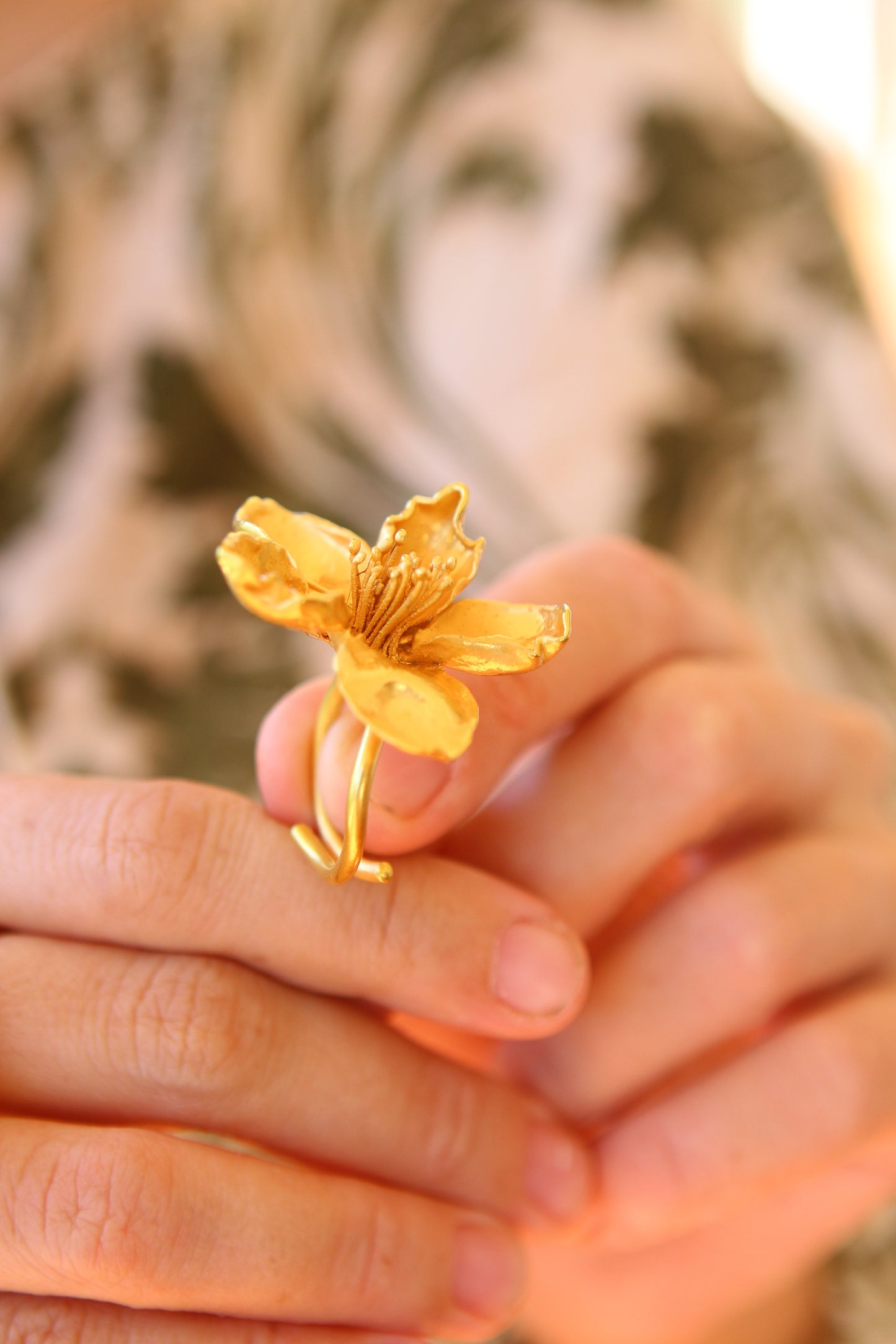 Anel com flor de cerejeira