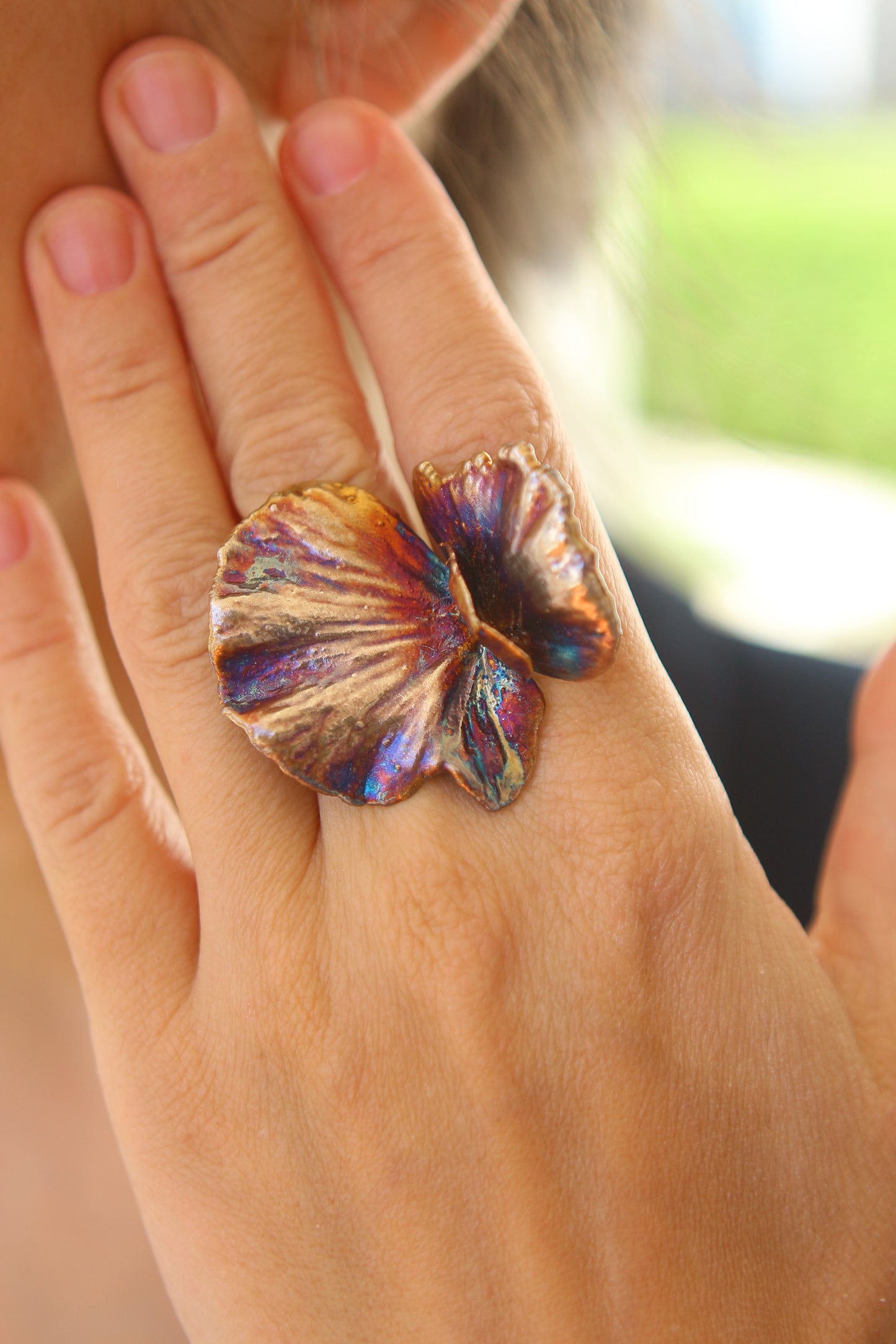 Anel com flor em forma de borboleta