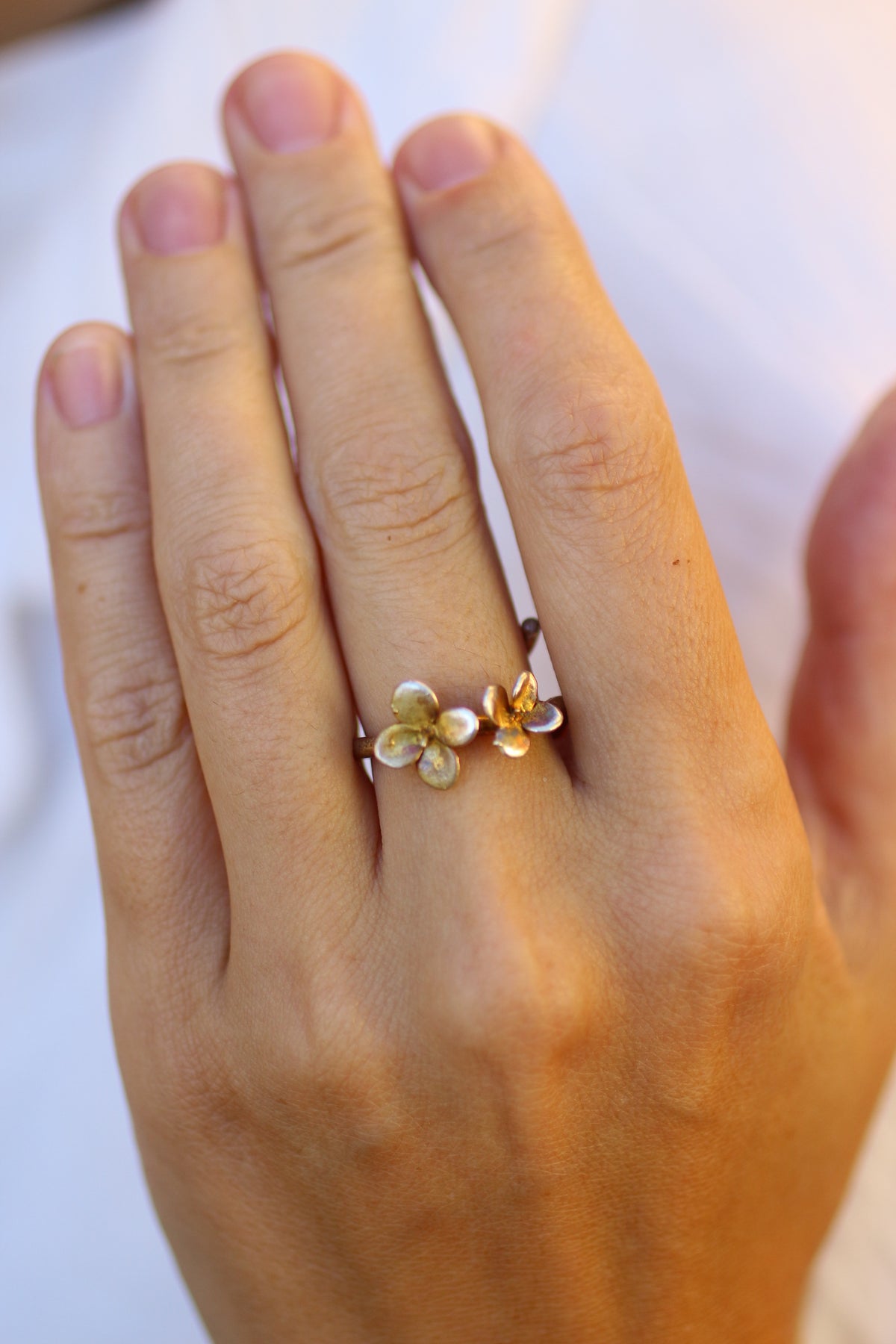 Anel com flores de hortensia